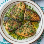Swordfish recipe grilled with garlic, lemon, and smoked paprika, served with fresh parsley.