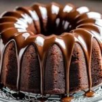 A rich and moist chocolate cream cheese pound cake, freshly baked with a deep chocolate color and a soft, dense texture.
