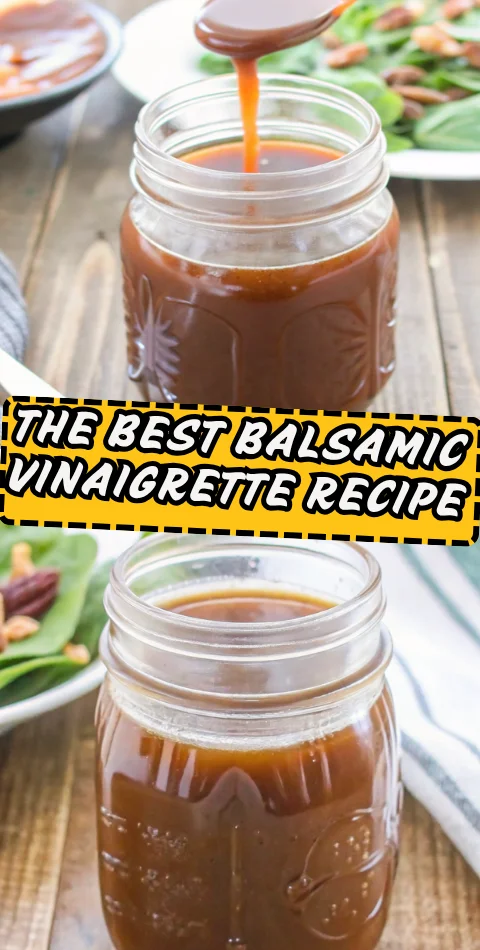 balsamic vinaigrette being drizzled from wooden spoon into glass jar with fresh salad greens in background